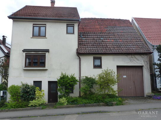 Einfamilienhaus mit Ausbaupotenzial und ruhigem Garten!