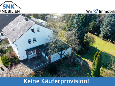 Zweifamilienhaus mit separatem Baugrundstück in schöner Lage von Gütersloh-Friedrichsdorf!