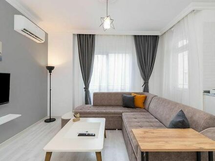 Minimalistische 1-Zimmer-Wohnung mit Balkon