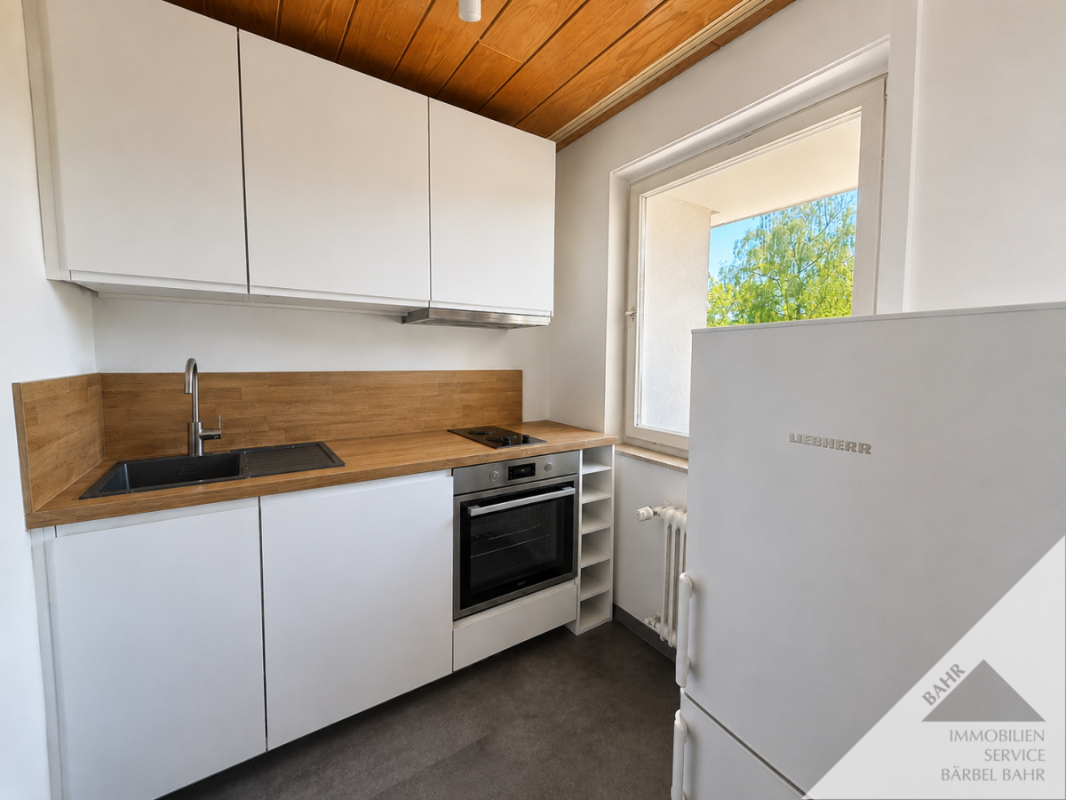 Kompakte 1-Zimmer-Wohnung mit moderner Einbauküche - Foto 1