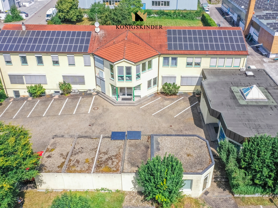 Bürogebäude mit Lagerräumen, teilbaren Einheiten und angrenzendem Bauplatz zu verkaufen