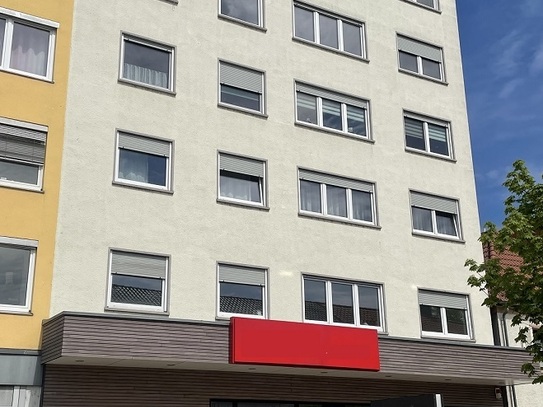 Wohn -und Geschäftshaus mit Lebensmitteldiscounter und Hotelkomplex