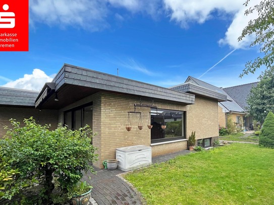 Weyhe: Geräumiger Bungalow mit großem Garten und zwei Garagen - Ihr Traumhaus wartet!