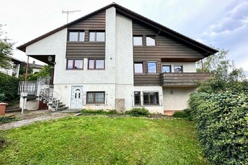 EINFAMILIENHAUS MIT EINLIEGERWOHNUNG UND DOPPELGARAGE