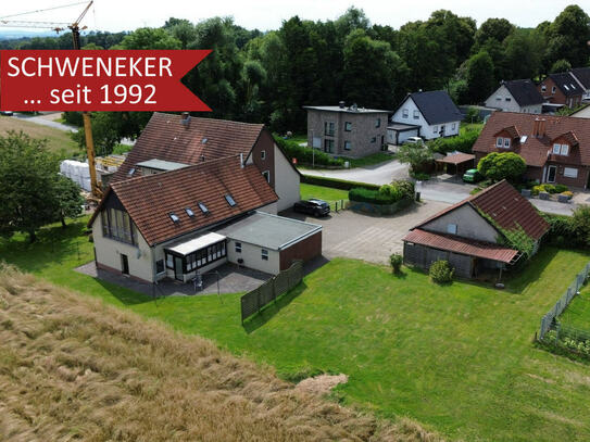 Wohnen oder vermieten in Bünde-Dünne! Dreifamilienhaus auf großem Grundstück + verpachteter Ackerfläche!