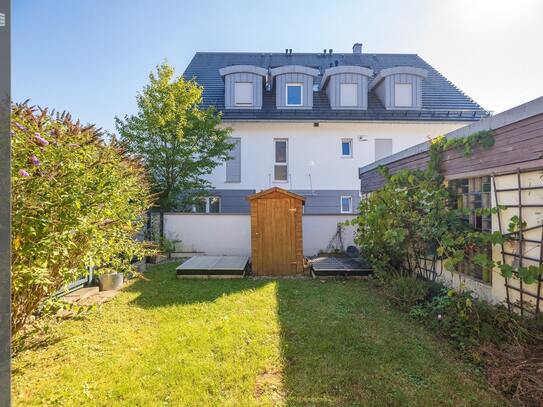 Vermietete Erdgeschosswohnung mit Wintergarten, Garten und Hobbyraum in kleinem Mehrfamilienhaus