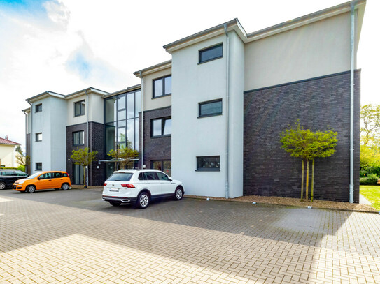 Schöne Erdgeschosswohnung mit Terrasse und Einbauküche in attraktiver Lage