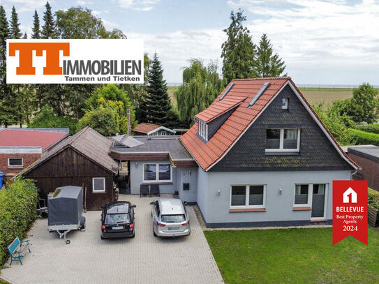 TT bietet an: Klasse modernisiertes Haus auf traumhaftem Grundstück am Deich als Ein- oder Zweifamilienhaus nutzbar!