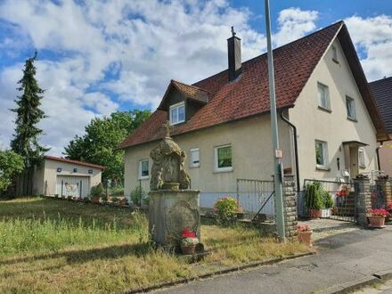 Sehr guter Standort! Gepflegtes Einfamilienhaus mit weiterer Wohnung in Ortsrandlage von 97440 Werneck-Vasbühl, 23 Minu…