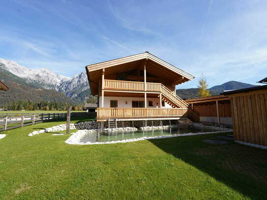 Design-Chalet mit Badeteich im Pillerseetal