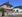 Mehrfamilienhaus mit Pkw-Stellplätzen
