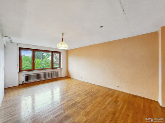 Freundliche Wohnung mit Gartenanteil, Balkon und Garage in ruhigem 3-Familien-Haus