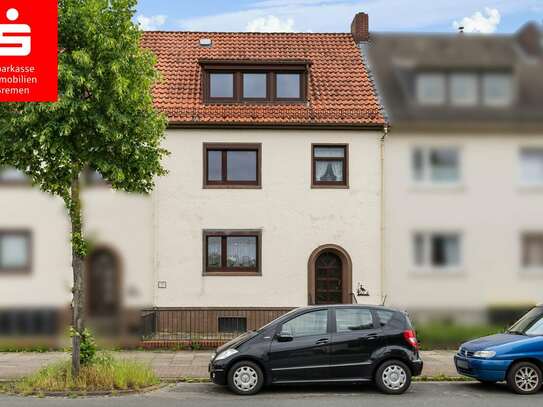 Bremen-Neustadt: Sanierungsbedürftiges Mehrfamilienhaus mit 3 Wohnungen und Garten
