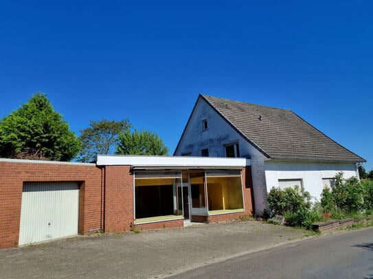 Einfamilienhaus mit kleinem Ladenlokal in P. W-Nammen