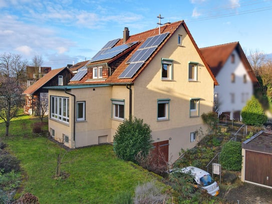 Großzügiges Familienhaus mit Gartenidylle und vielseitigen Nutzungsmöglichkeiten