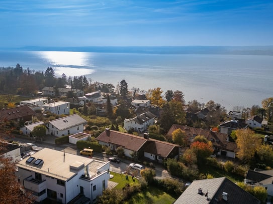 Exklusives Doppelhausanwesen mit Einliegerwohnung, außergewöhnlicher Raumhöhe & Seeblick in Top-Lage