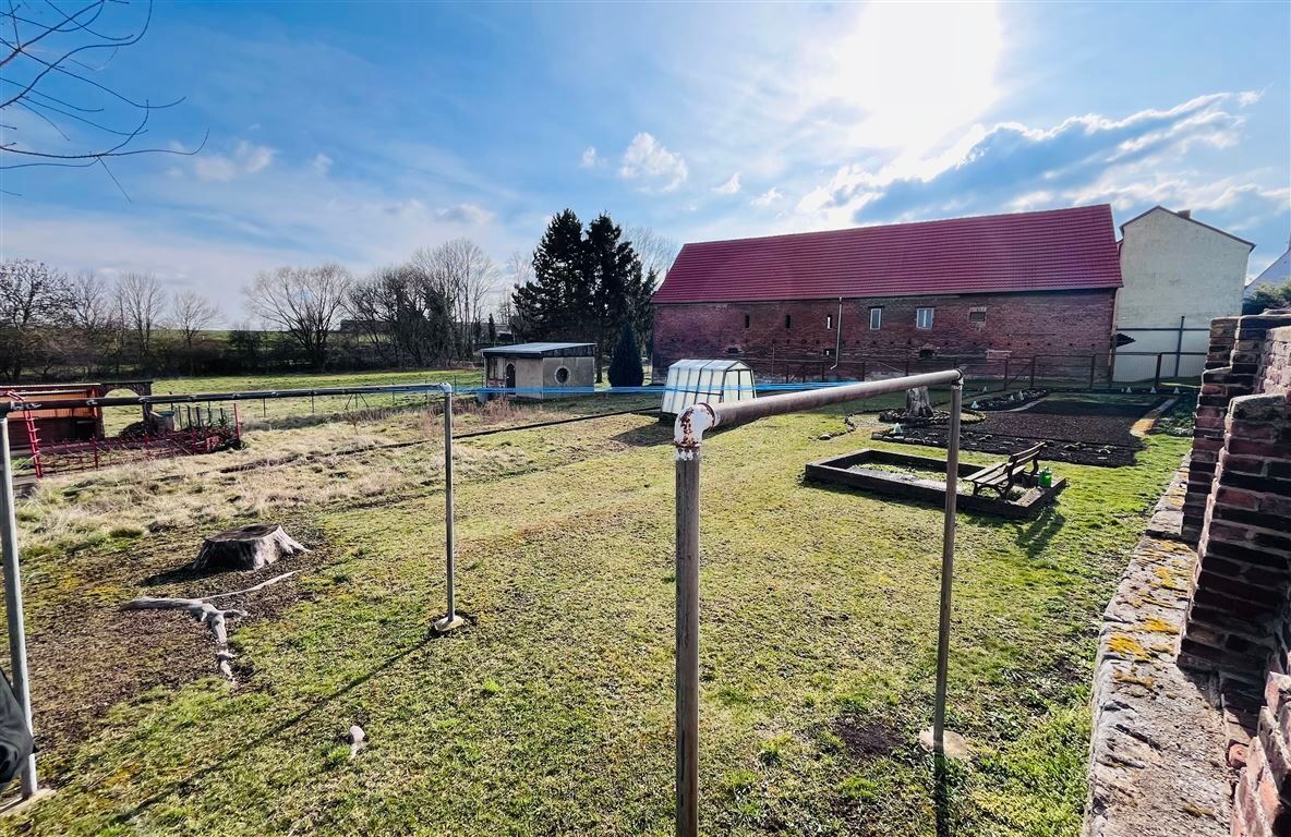 Attraktives Investment: Mehrfamilienhaus mit Nebengebäuden und umfangreichem Bauland – 06679 Hohenmölsen, 6679 Hohenmölsen – Vorschaubild 12