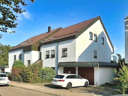 Exklusive Erdgeschosswohnung mit Gartenanteil und Garage in begehrter Lage