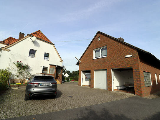 Einfamilienhaus m. Nebengebäude (ggf. zu einer Wohnung ausbaubar) in ländlicher Lage