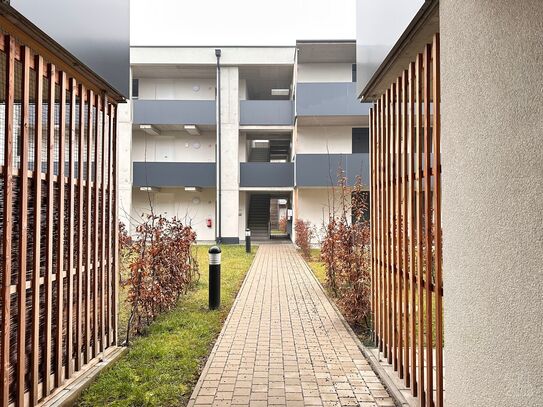 Charmante 2 Zimmer Wohnung mit Tiefgaragenparkplatz