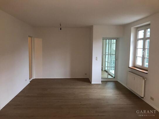 Für Sie neu renoviert! Wohnung mit Altbaucharakter in zentraler Lage mit Garten.