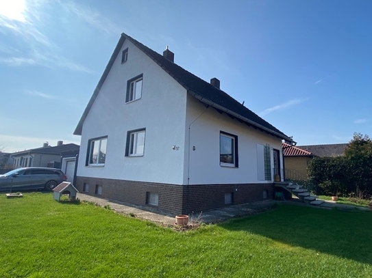 Modernisiertes Einfamilienhaus mit Solarthermie, Vollkeller und Garage in ruhiger Feldrandlage