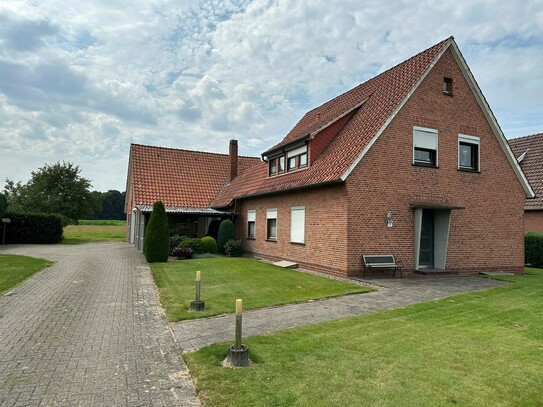 Für Naturliebhaber! Freistehendes Einfamilienhaus in ruhiger Siedlung mit großem Grundstück und Blick auf Felder und Na…