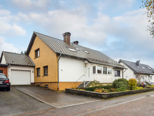 Großzügiges Ein – Zweifamilienhaus in gesuchter Ortsrandlage