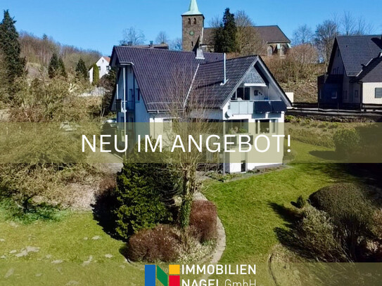 Vermietet und modernisiert: Attraktives Dreifamilienhaus in idyllischer Hanglage