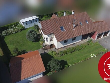Einfamilienhaus mit 4 Garagen und Garten in 88339 Bad Waldsee - Reute