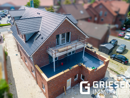 Exklusives Wohnen! Großzügige Neubauwohnung mit Dachterrasse - Erstbezug - in zentraler ruhiger Lage von Haren!