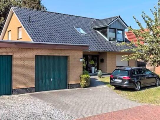 Zwangsversteigerung - Einfamilienhaus mit Garage in Ostrhauderfehn