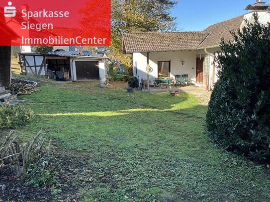 Winkelbungalow im Dornröschenschlaf - mit Garage & Einliegerwohnung im UG * Siegen-Eiserfeld