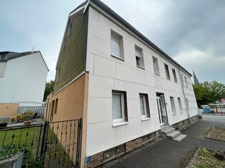 Gelegenheit: Mehrfamilienhaus mit Doppelgarage in Dortmund-Marten zu verkaufen