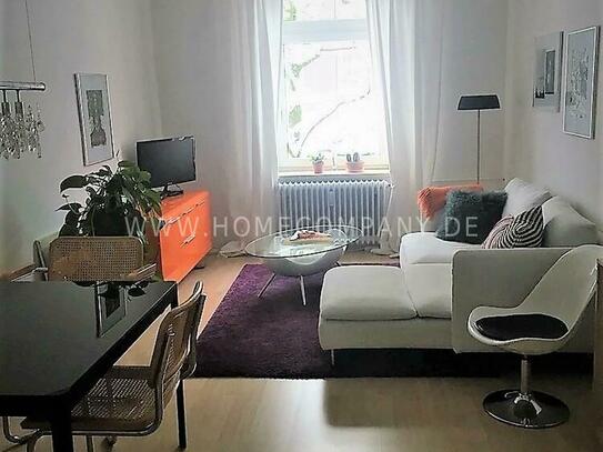 Helle, neuwertig möblierte 2-Zimmer-Altbauwohnung mit Balkon in München-Schwabing