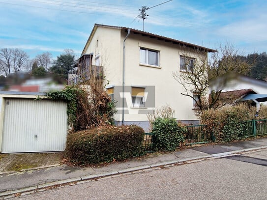 Idyllisches Zweifamilienhaus mit großzügigem Garten in schöner Lage!