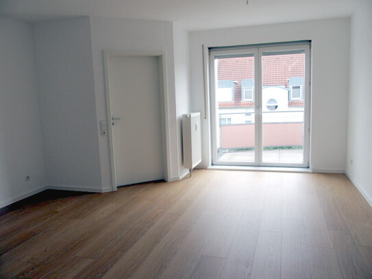 Ideale Kapitalanlage - Moderne, lichtdurchflutete 3-Zimmer-Wohnung mit Südwestbalkon, Einbauküche und Tiefgaragenstellp…