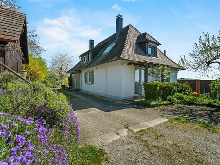 Vielfältig nutzbares Zweifamilienhaus in See- und Bergsichtlage mit viel Potential