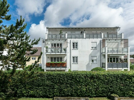 Reizende 3-Zimmer-Wohnung mit Balkon und Tiefgaragenstellplatz - ganz zentral in Ludwigsfeld