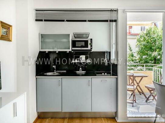 Schönes modernes möbliertes 1-Zimmer-Apartment mit Balkon in Schwabing