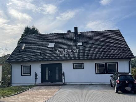 Einfamilienhaus mit Einliegerwohnung und kostenloser Finanzierungsklärung.