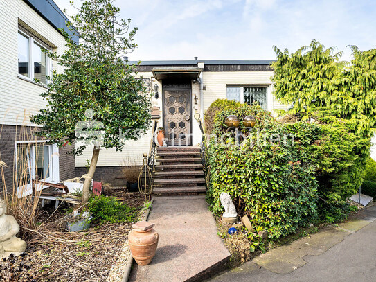 Schönes kleines Reihenmittelhaus in zentraler Lage mit eigenem Grundstück und Garage!