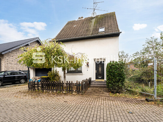 Stark sanierungsbedürftiges Einfamilienhaus mit Garage in Elsdorf-Esch.