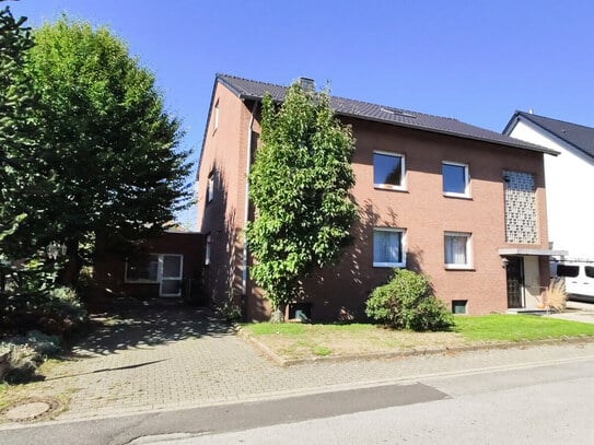 3-Familienhaus mit großem Garten, Garage und separatem Gewerberaum