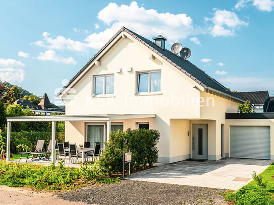 Idyllisch wohnen am Rhein - Moderne freistehende Einfamilienhäuser in ruhiger Lage.