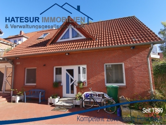 Charmante Maisonette-Wohnung mit Dachterrasse, Balkon und Garten zu vermieten