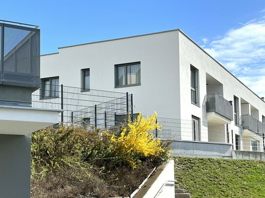 Neuwertige 3-Zimmer Eigentumswohnung mit Seeblick in zentraler Lage