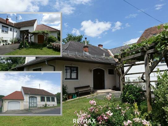 2 Häuser, idyllischer Garten mit Quelle, Brunnen, schöner Innenhof und Garage!