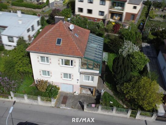 Einfamilienhaus mit Wintergarten in schöner Siedlungslage