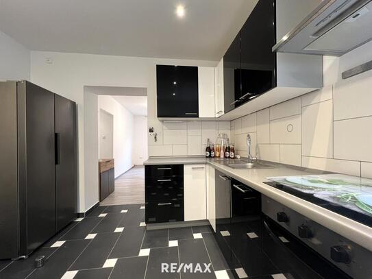 Moderne, sanierte 3-Zimmer-Eigentumswohnung mit Gartenanteil und Garage